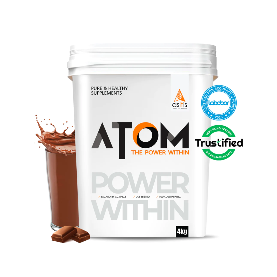 White supplement container with 'ATOM' branding and a glass of chocolate powder on a white background