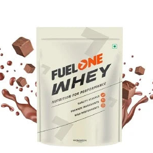 Fuel One Whey protein powder package with chocolate pieces around on a white background