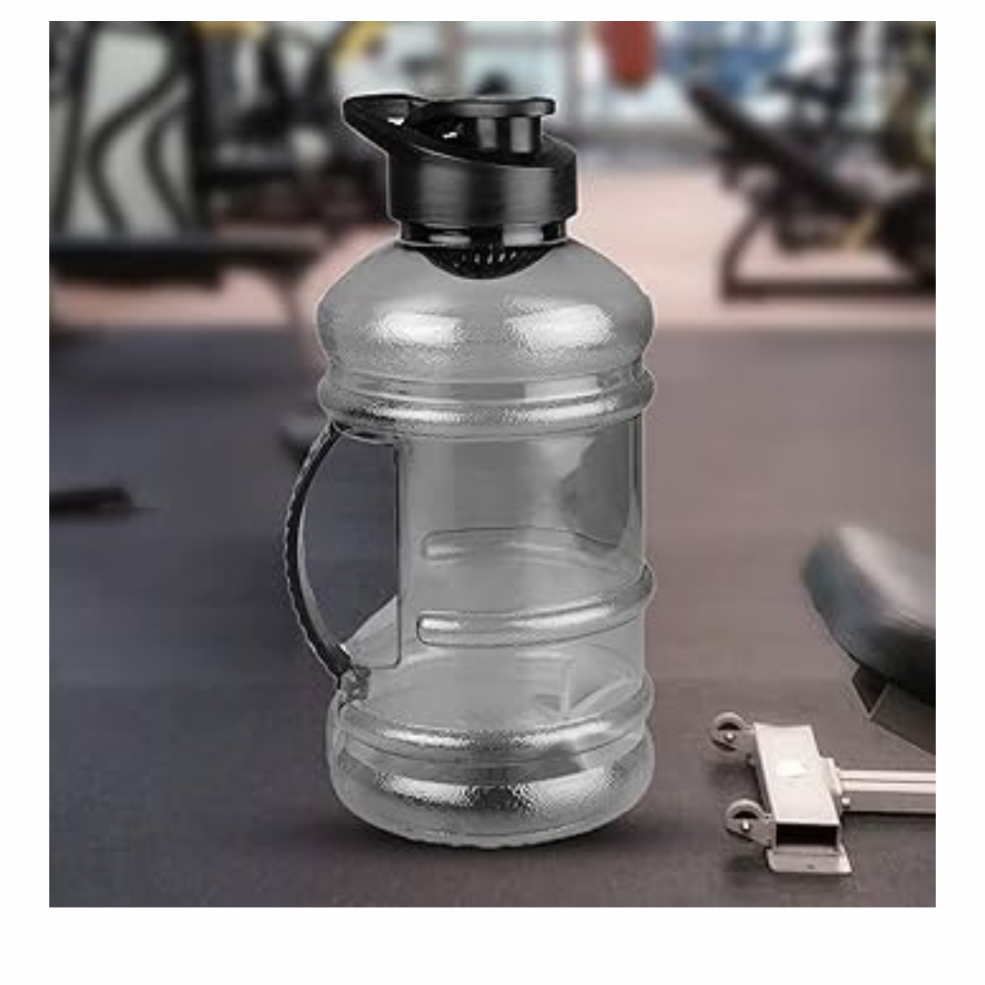 Large water bottle with black cap on a gym floor