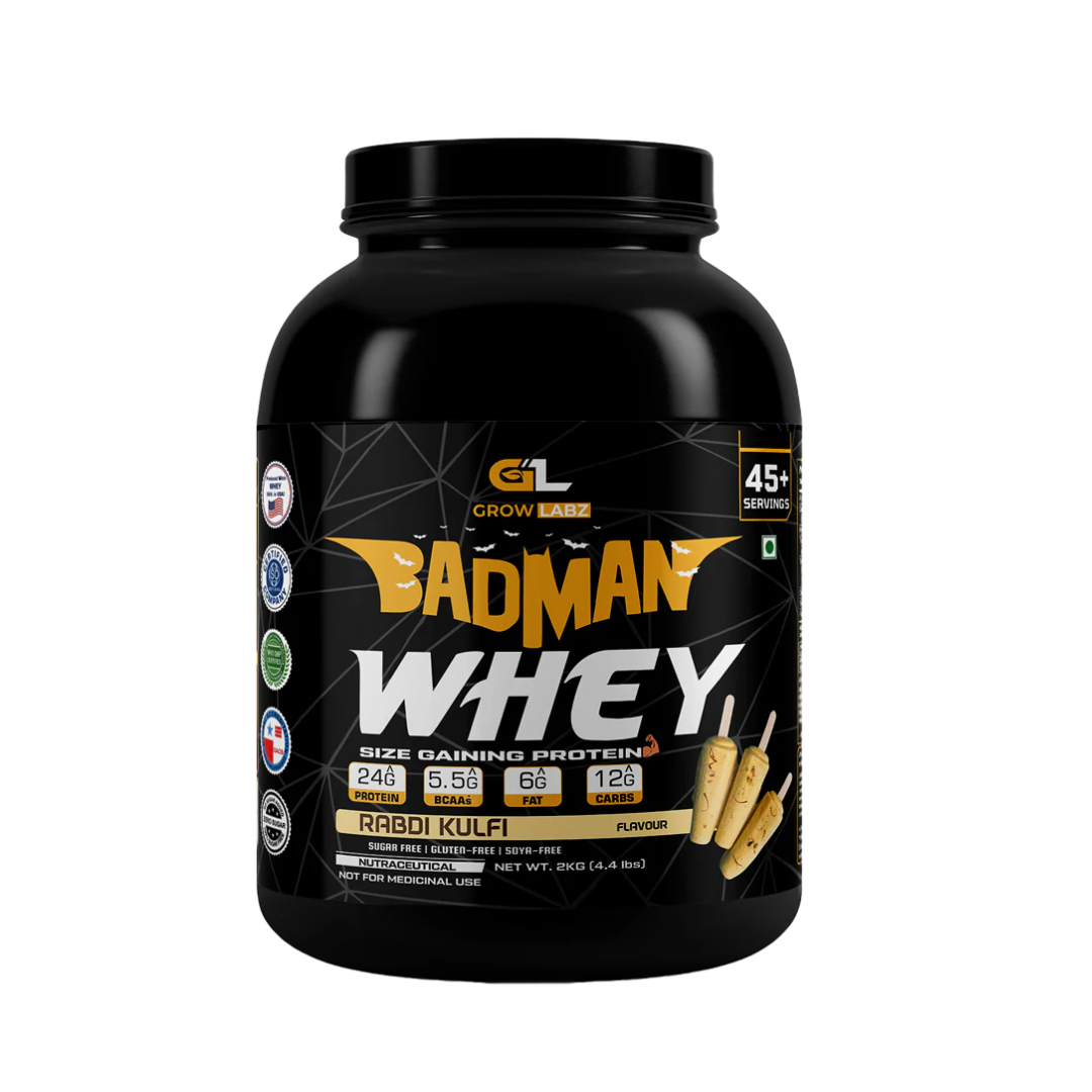 Black protein supplement container with 'Badman Whey' branding on a white background