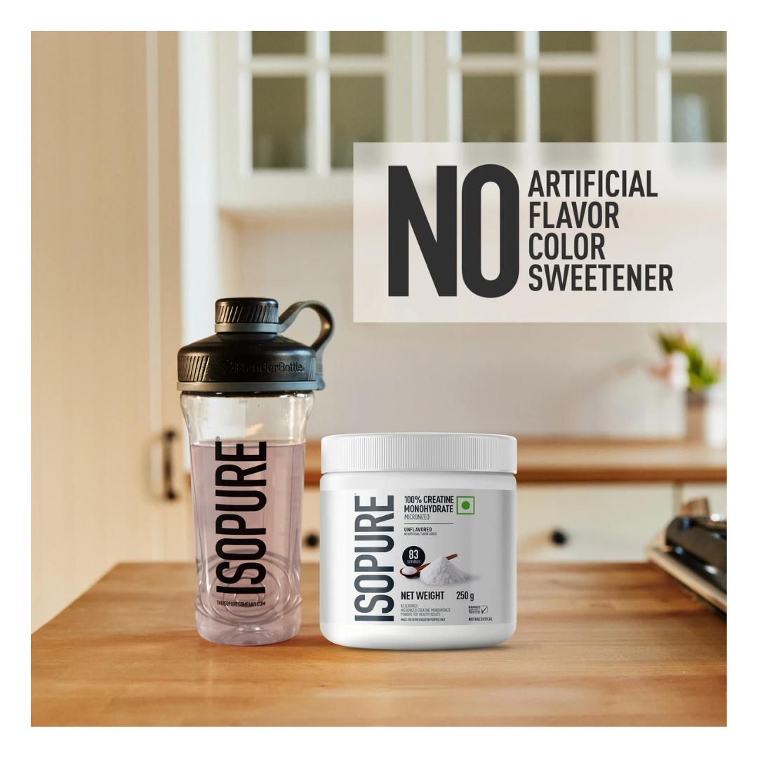 ISOPURE protein powder container and shaker bottle on a kitchen counter with a sign indicating no artificial ingredients.