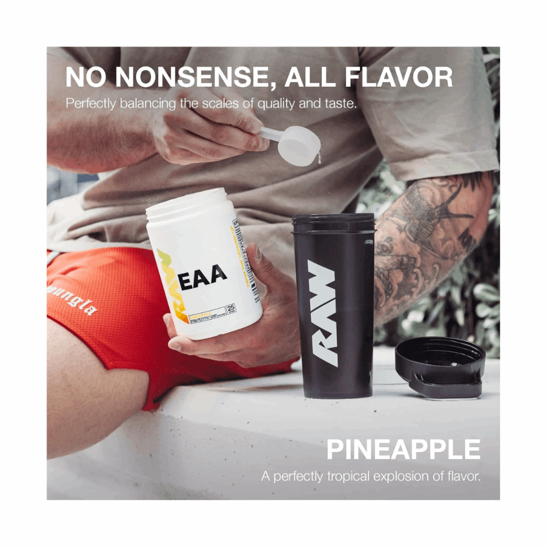 Person holding a container of EAA powder with a RAW supplement cup, outdoors.