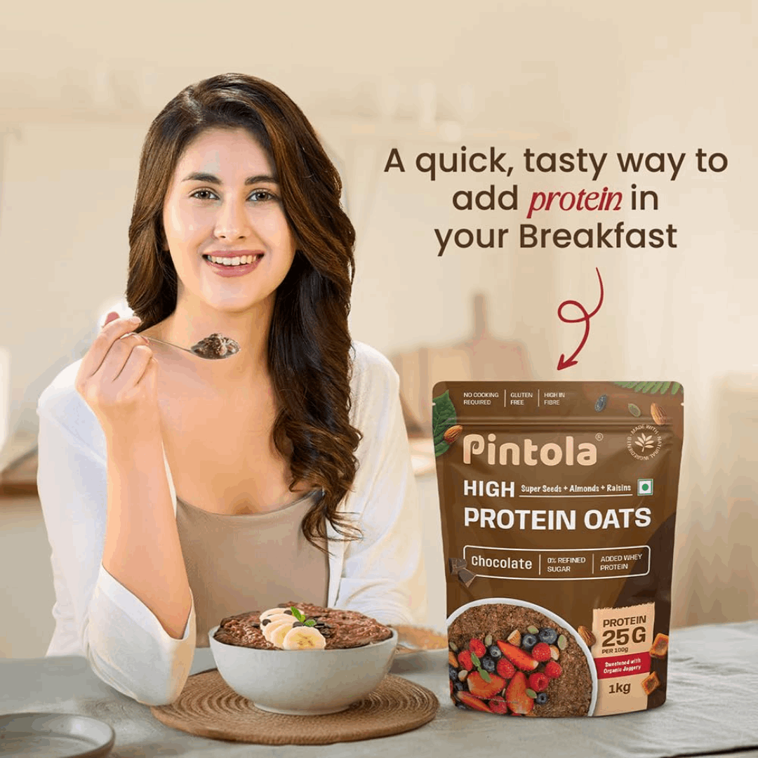 Woman eating a bowl of oats with a Pintola High Protein Oats package on a table.